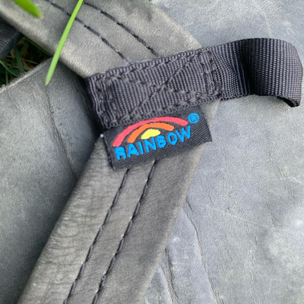 Grey rainbow flip flops